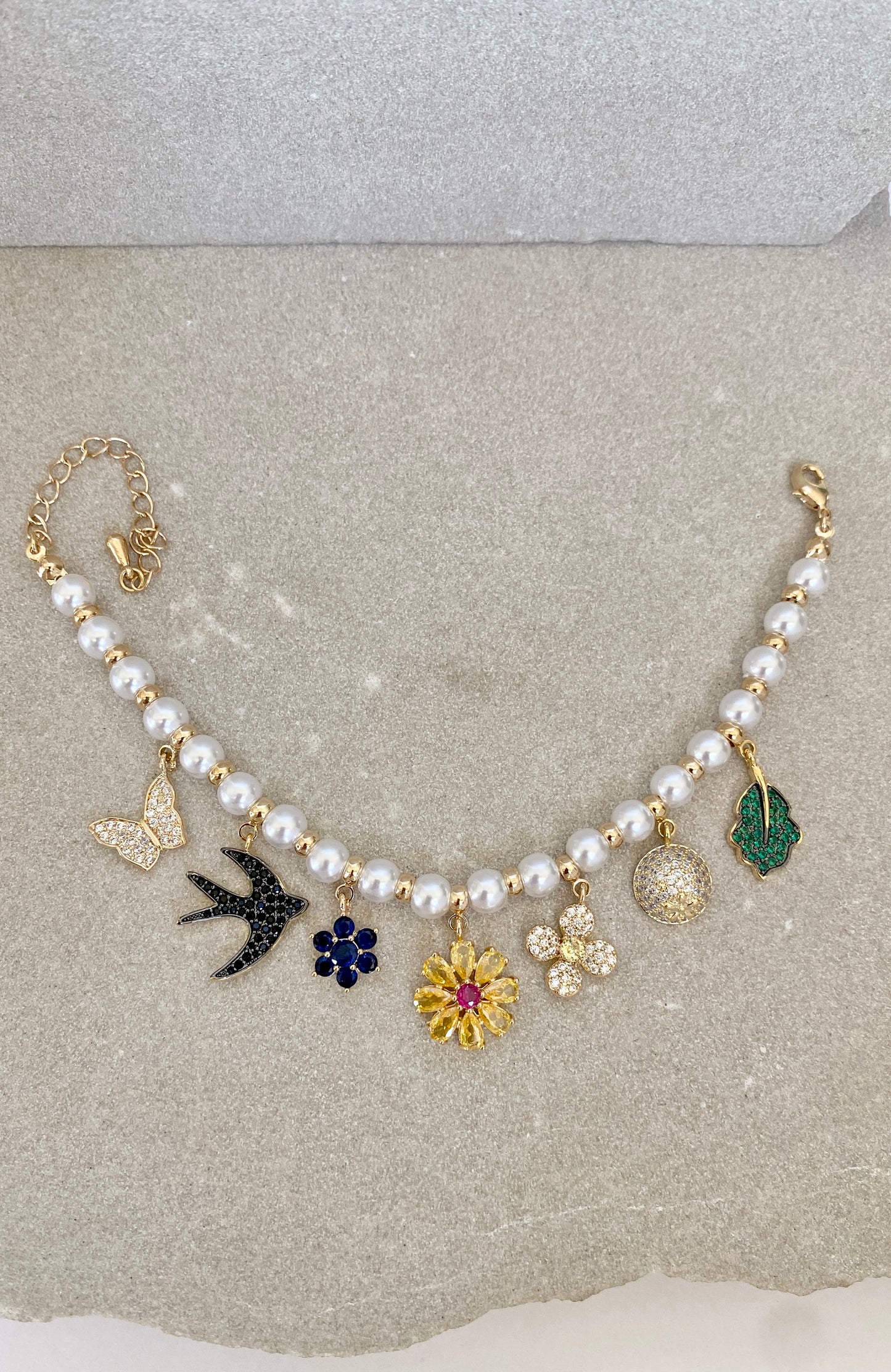 Pearl charm bracelet