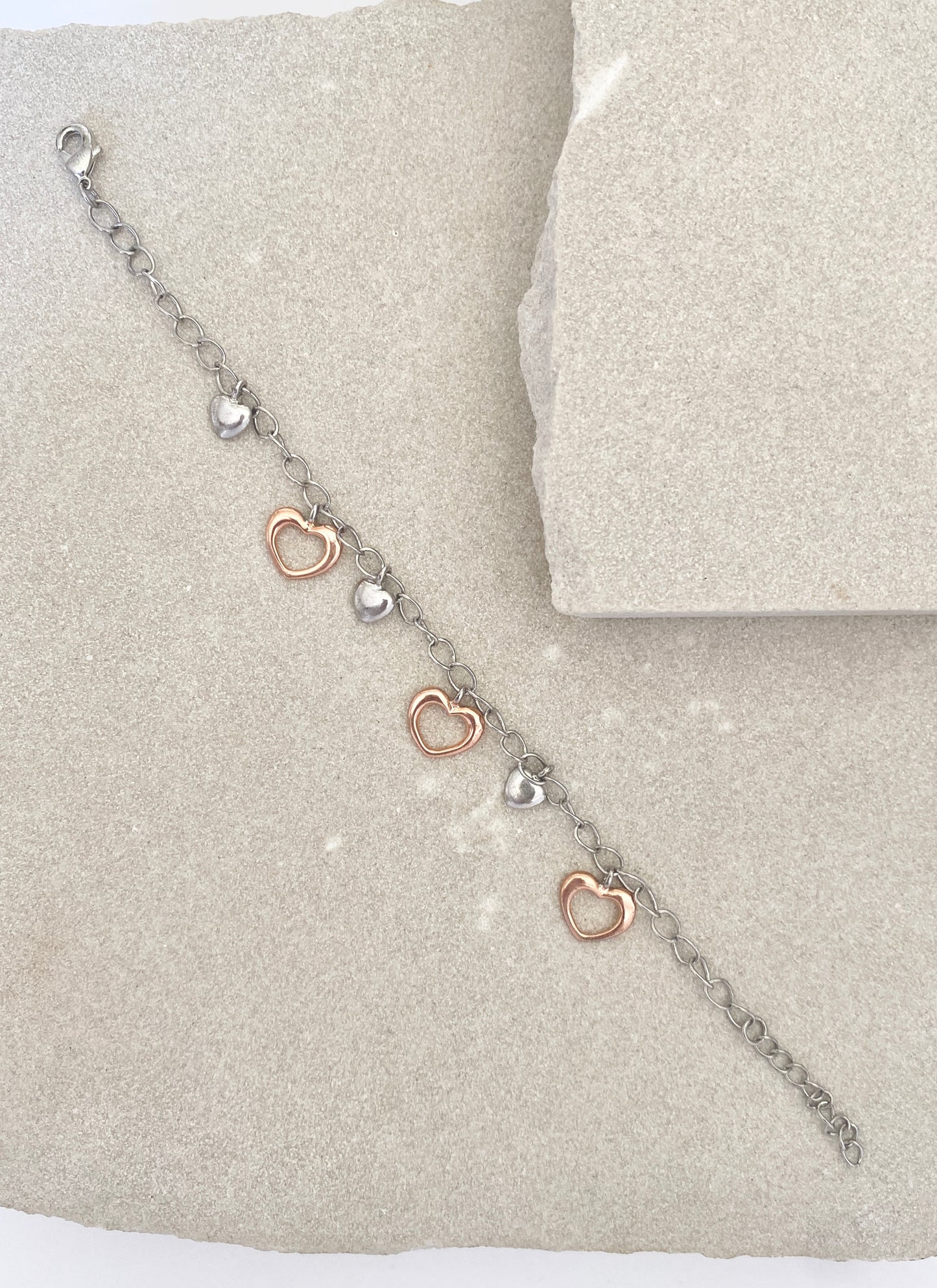 Rose gold and silver hearts bracelet