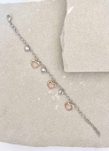 Rose gold and silver hearts bracelet