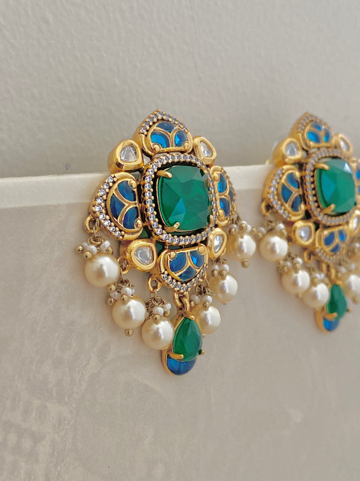 Emerald Frame Studs