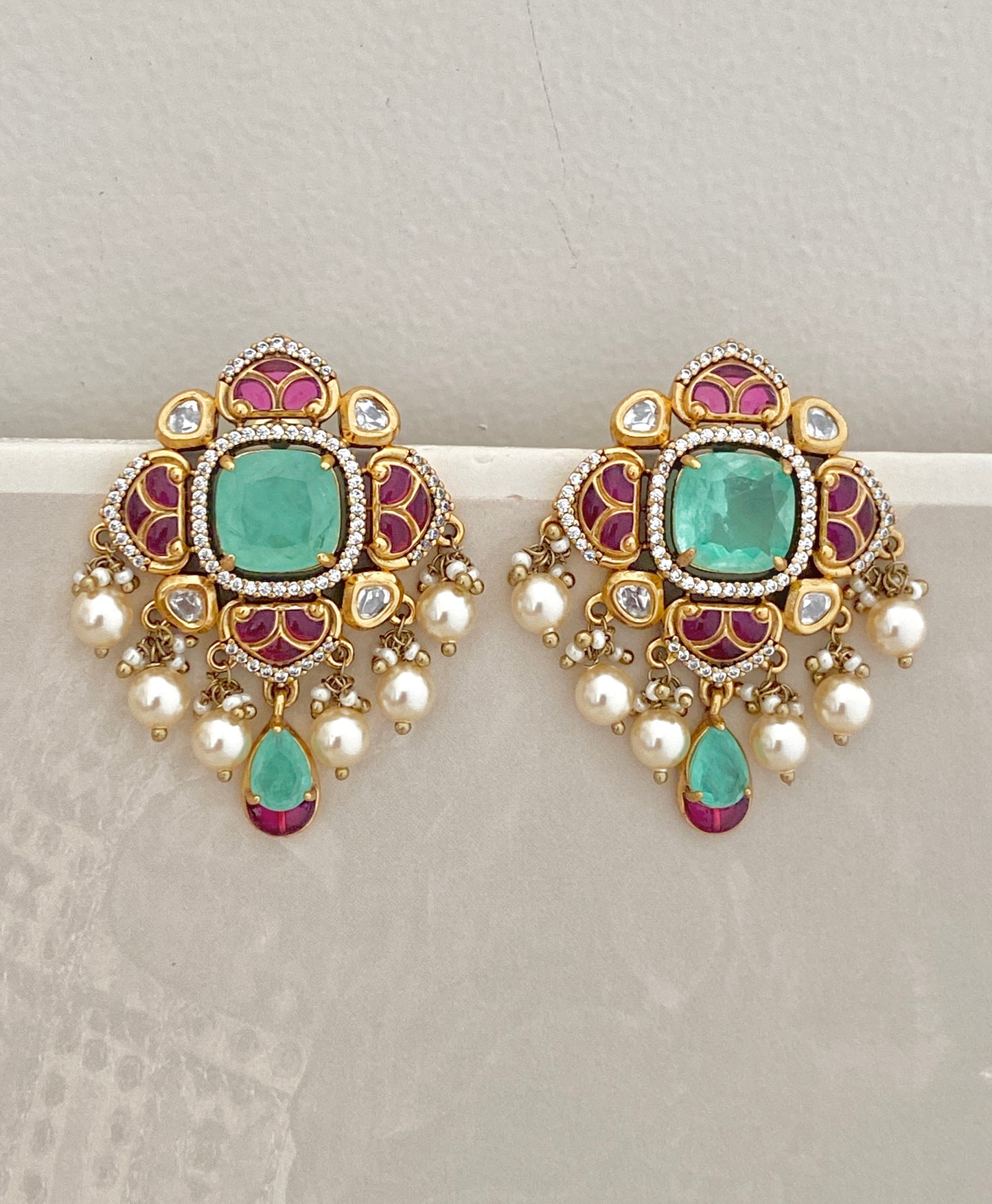Emerald Frame Studs